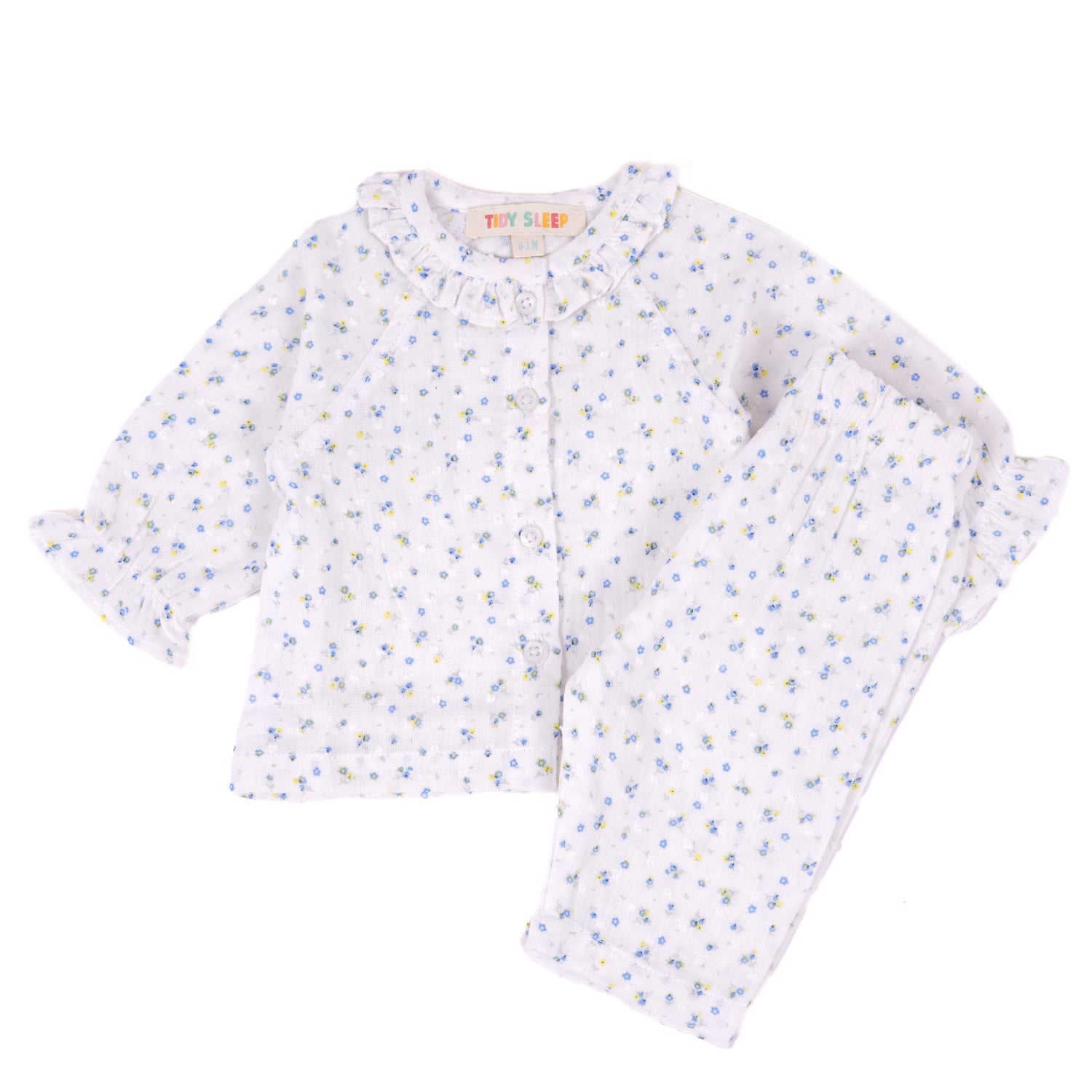 A white baby pajama/ jhabla set with a floral print