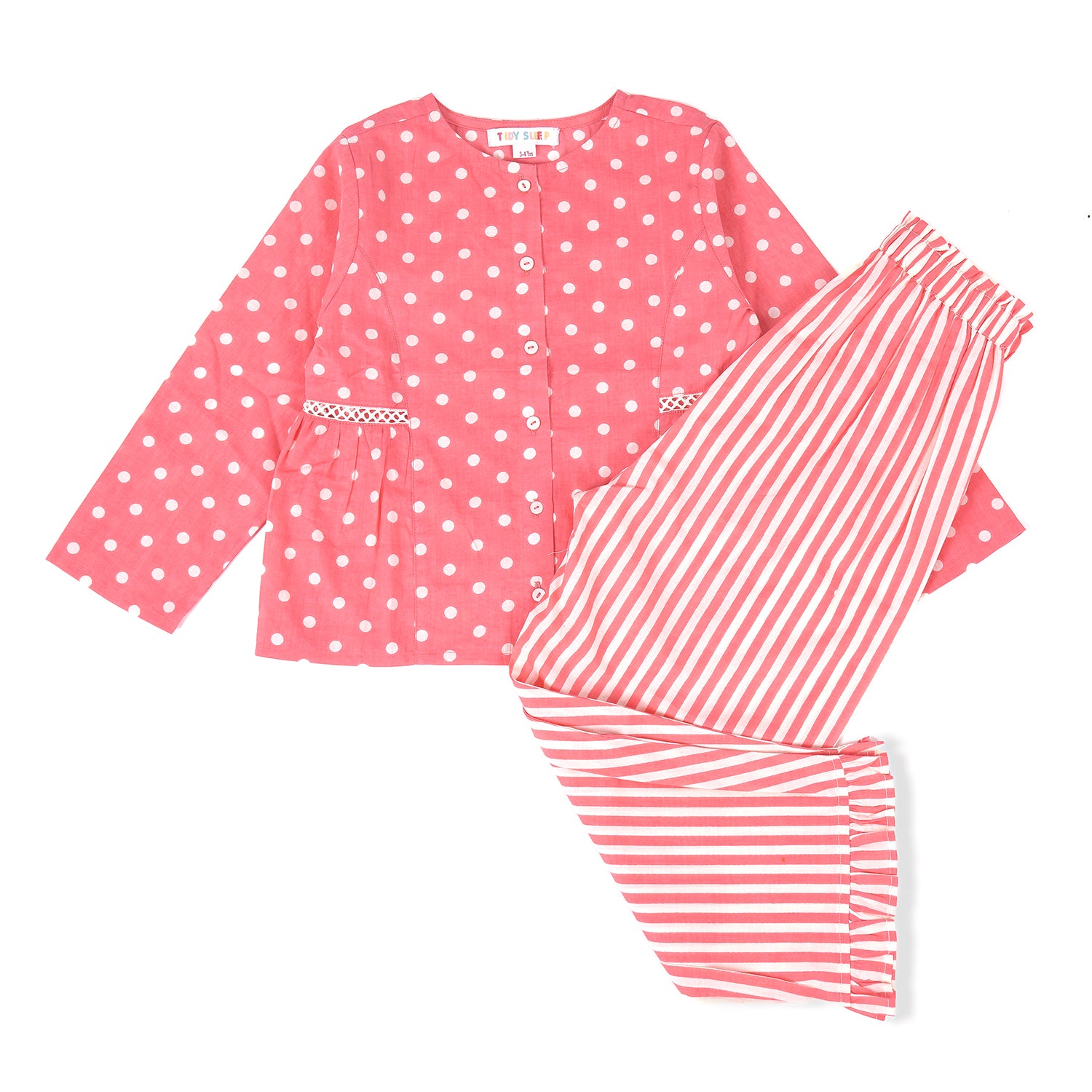 Pink long-sleeved pajama set for kids with white polka dots on the top and white stripes on the pants.