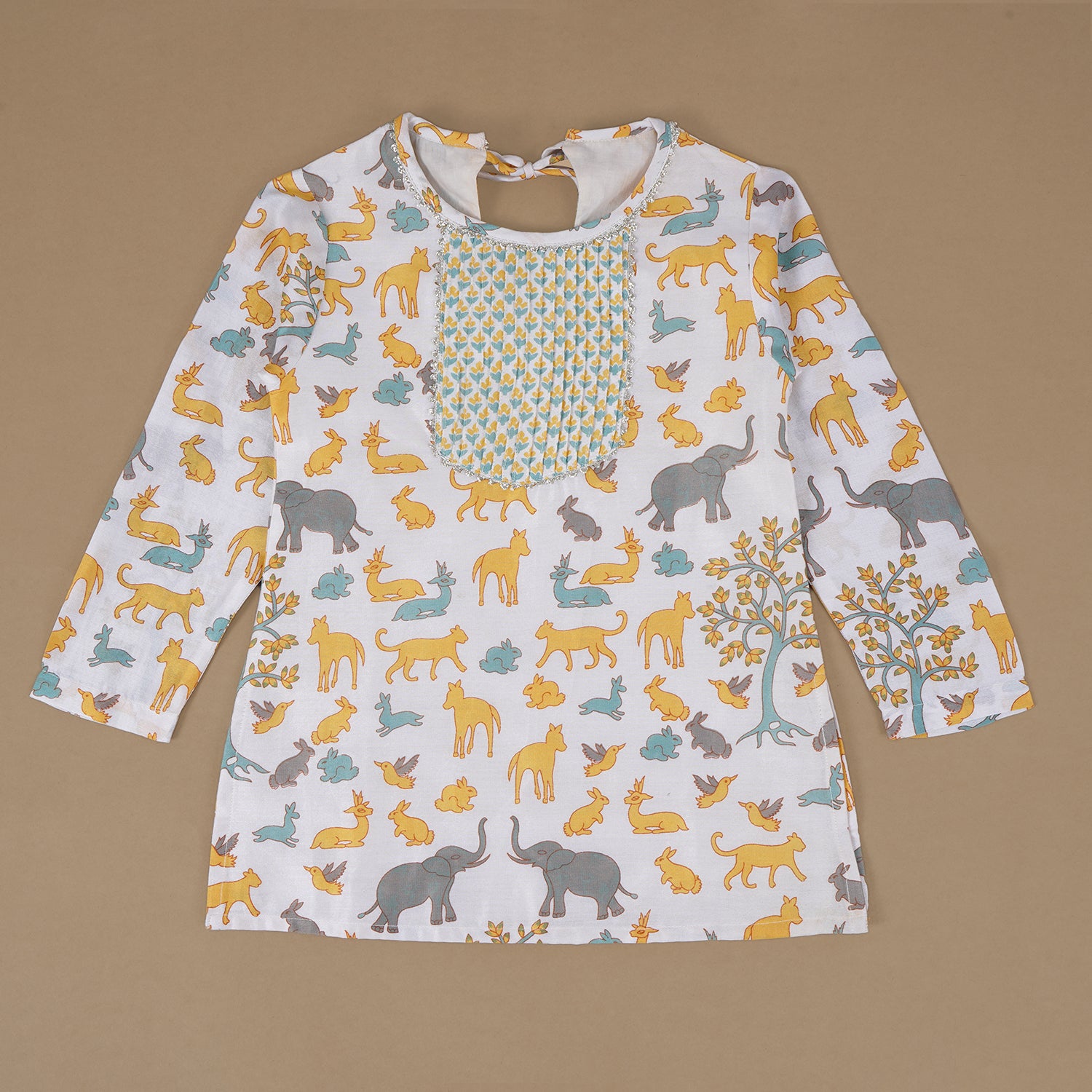 A white kurta for a child with a round neckline and a colorful print of various animals like elephants, rabbits, cats, and birds.