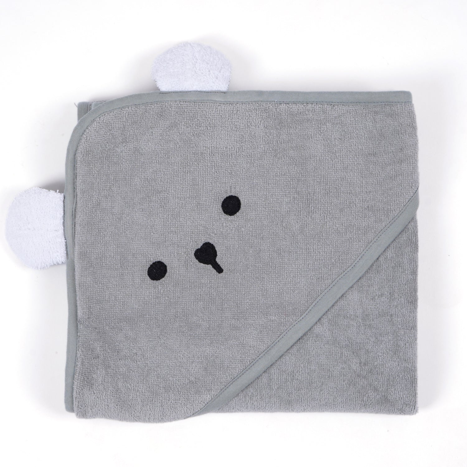 A close-up of a gray hooded baby towel. The hood features a cute bear face with embroidered eyes, nose, and mouth.