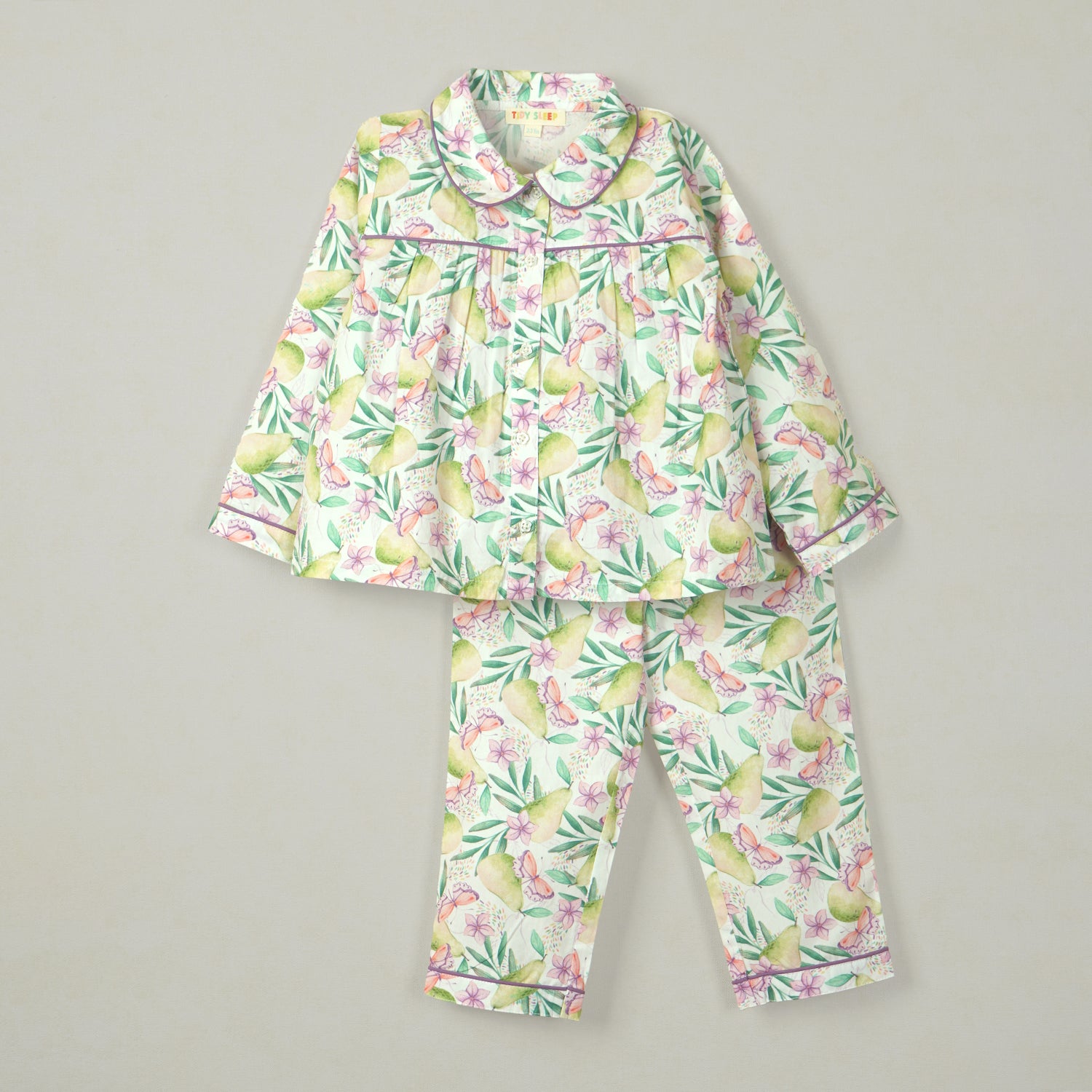 Baby pajama set with a tropical fruit and floral print, featuring a button-up top with a collar and matching pants.