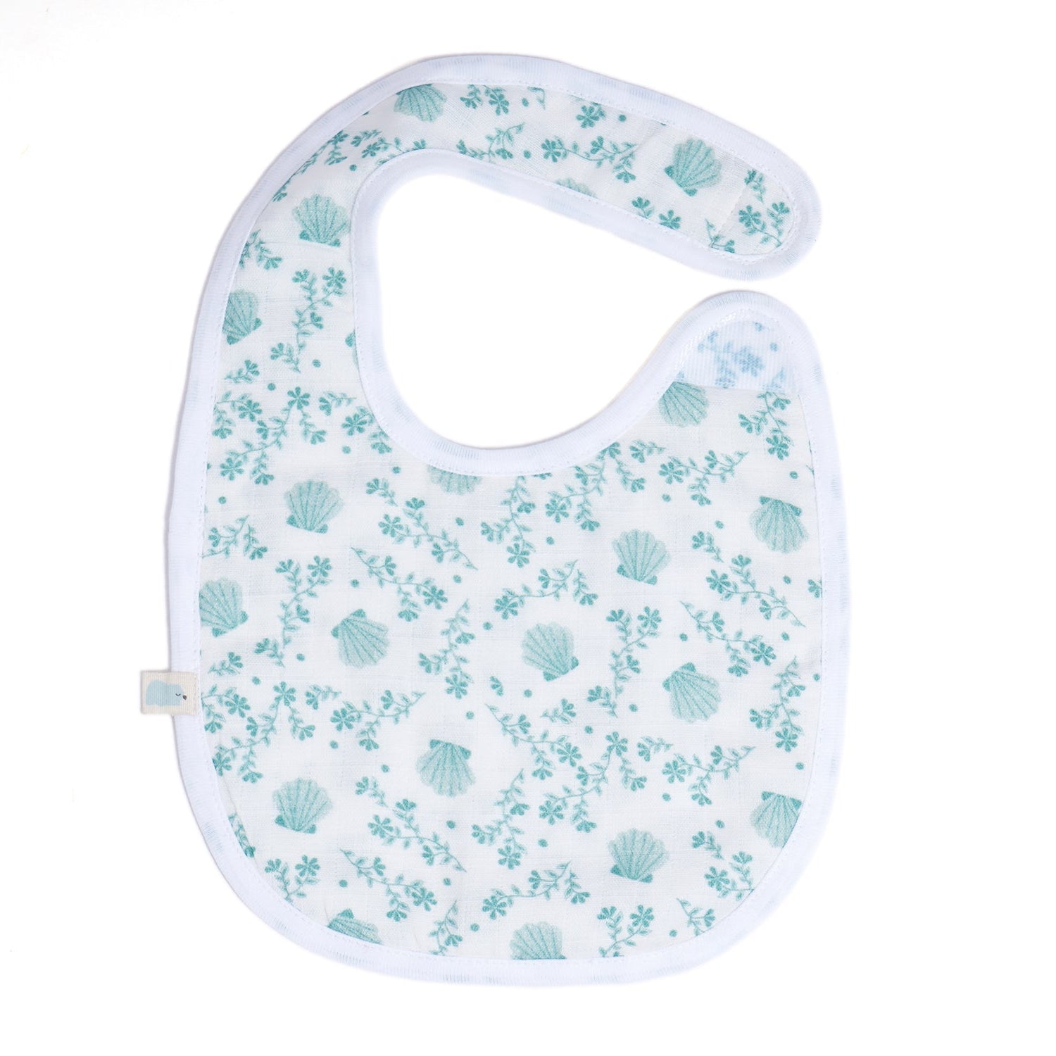 White baby bib with a light blue seashell and floral print, featuring a soft fabric.