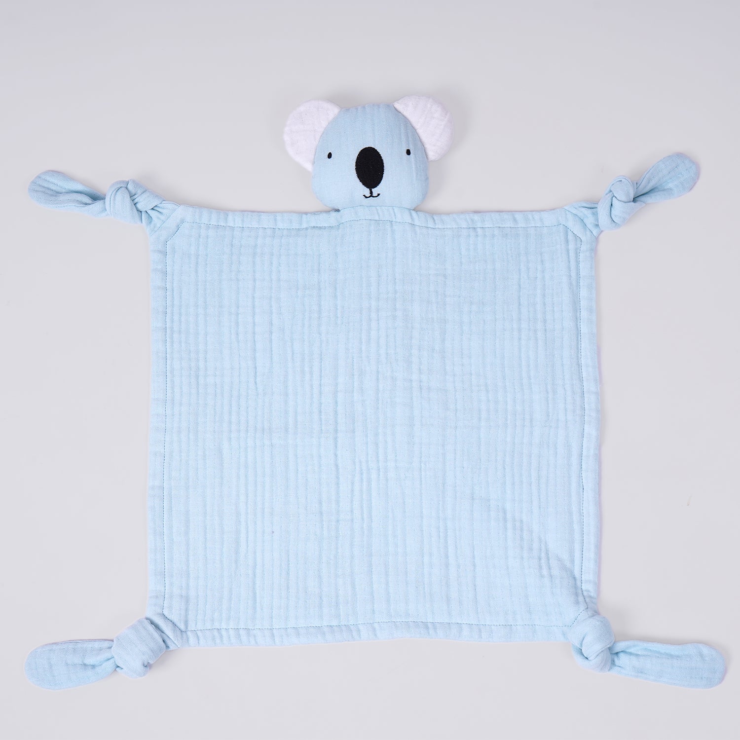 Light blue face napkin with a cute koala head design and knotted corners, perfect for babies and kids.