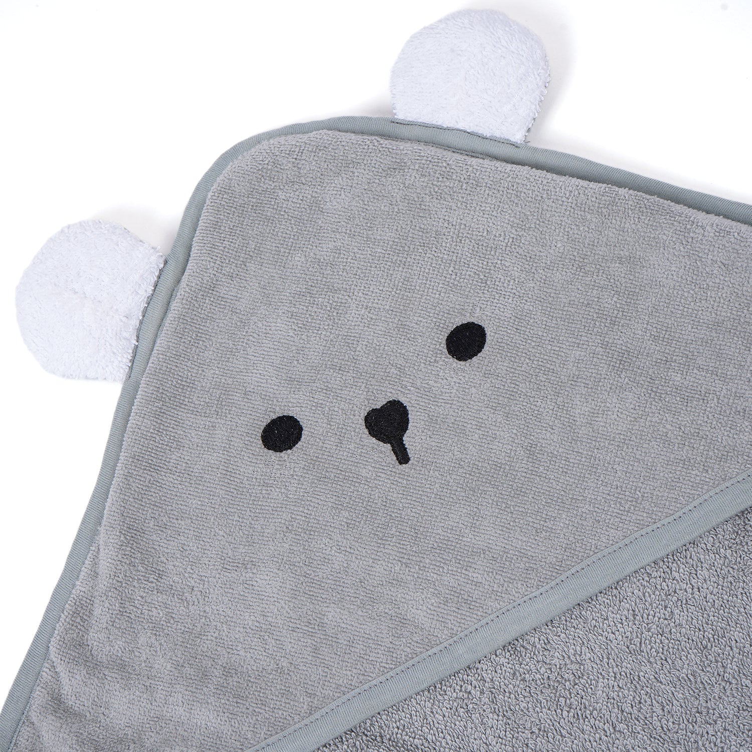 A close-up of a gray hooded baby towel